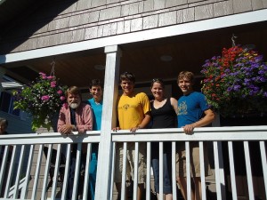 Rick Derksen in front of his home with his family, Marilyn, Jeremiah, Karina and Andrew