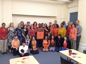 Persimmon Power! YWCA Seneca staff and clients standing against racism (ok, so some are technically sitting).