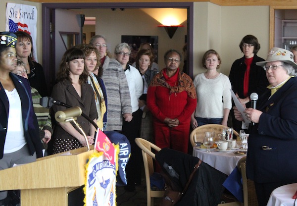 US Marine Corps veteran Julia Sheriden (far right) recognizes the service of other military veterans including Sheila Sebron (far left) at a Veterans Day brunch organized by Outreach and Resource Services for Women Veterans.