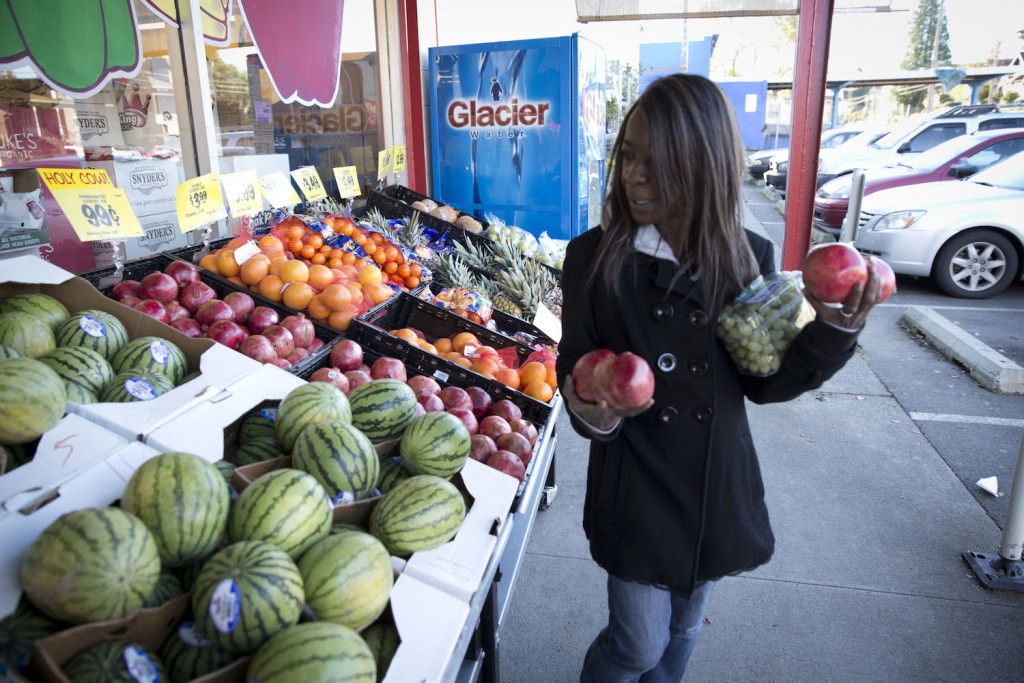 Andrea shops at a discount market a short walk from her transitional housing apartment.