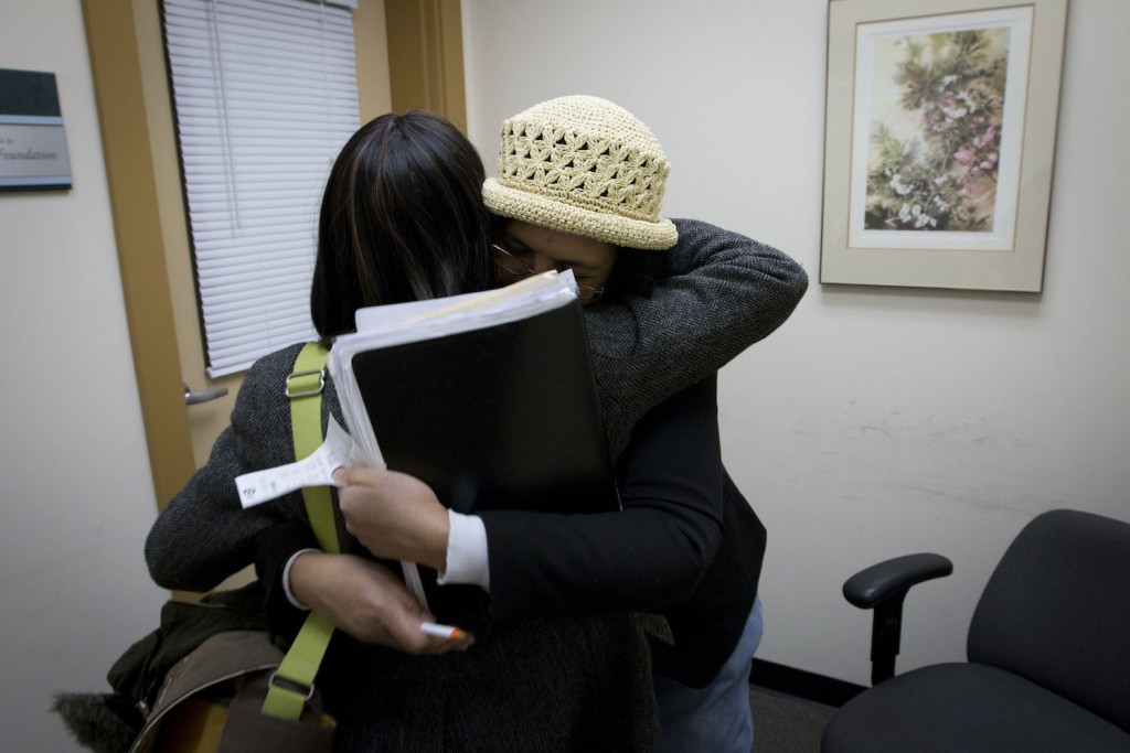 Andrea gets some supportive advice and a hug from her YWCA case manager.