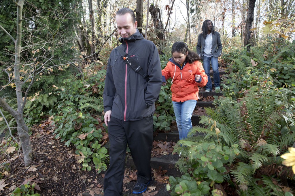 Lawrence, Zoe and Andrea enjoy a stroll in a neighborhood park. Family bonding time is rare and precious, Andrea told Lawrence in their StoryCorps conversation: "We don’t have holidays. We don’t have vacations. We have errands, and stuff to do, you know."