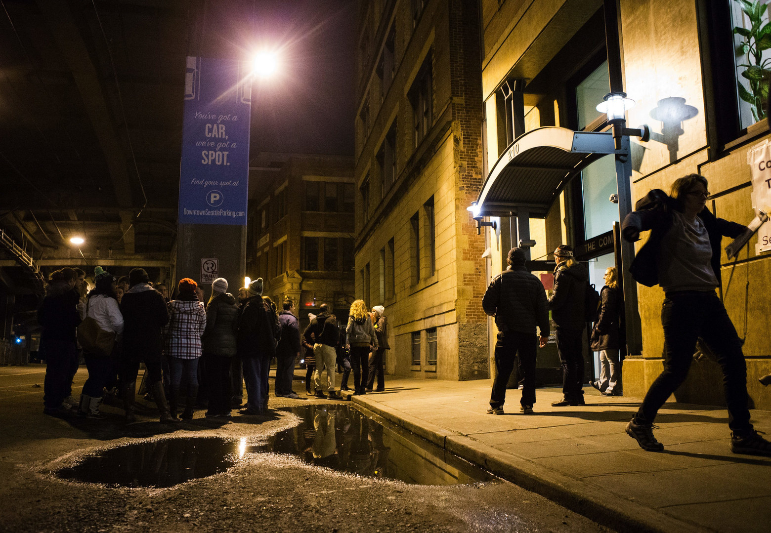 Volunteers begin to split up into their groups to start the count during the annual One Night Count hosted by the Seattle/King County Coalition on Homelessness on Friday, Jan. 29, 2016. More than 1,000 volunteers gathered at 11 different locations throughout the county from 2-5 a.m., splitting up into teams to count the number of people sleeping on the streets. Photo by Lindsey Wasson/The Seattle Times