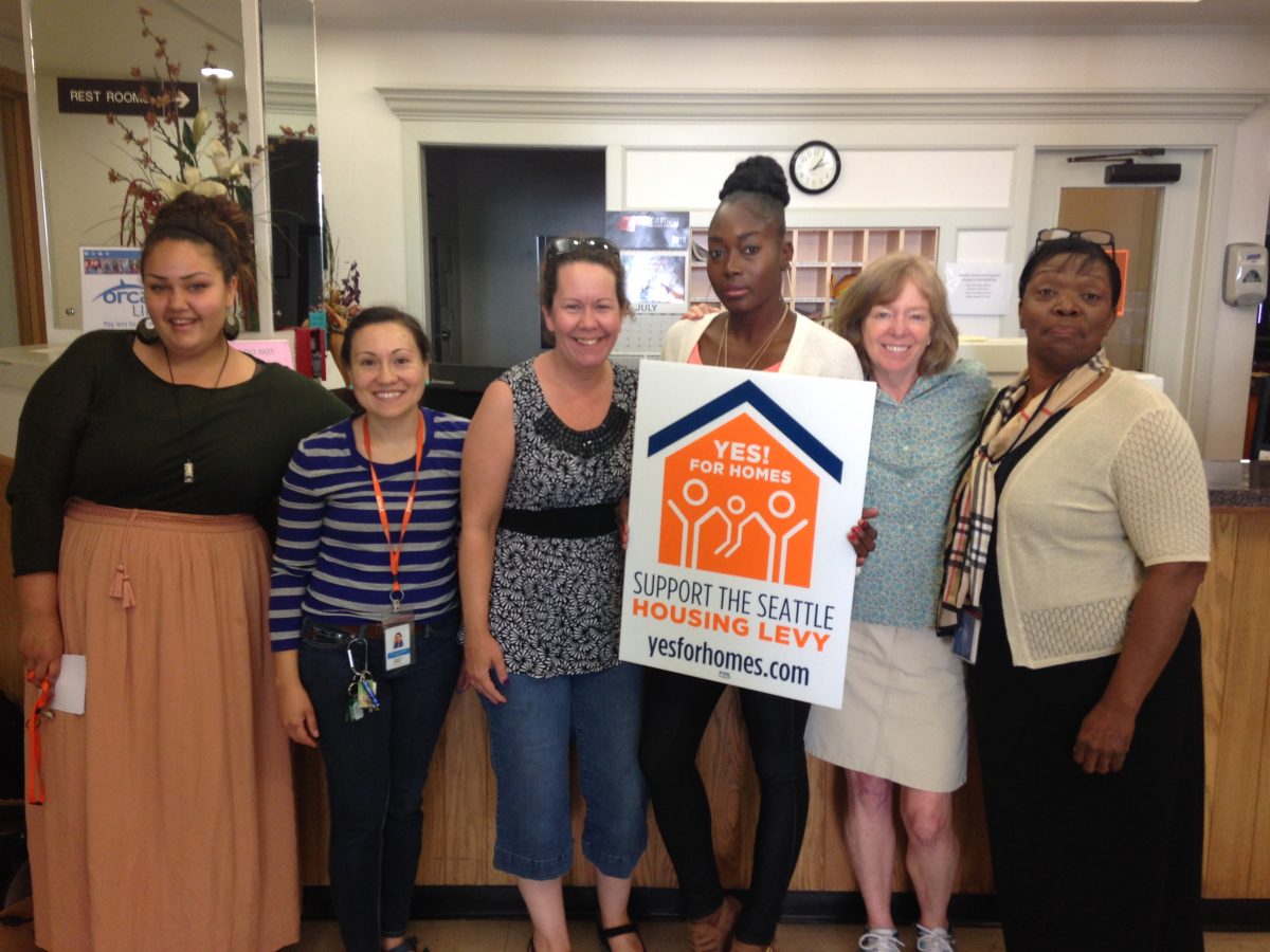 Staff at YWCA Seattle | King | Snohomish show their support for Prop. 1, the Seattle Housing Levy.