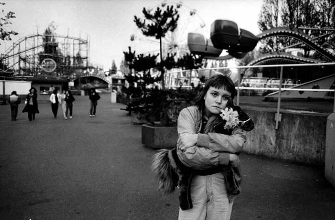 Erin holding her Horsey, a gift from Mary Ellen Mark, at a theme park in the early 1980s. Photograph by Mary Ellen Mark.